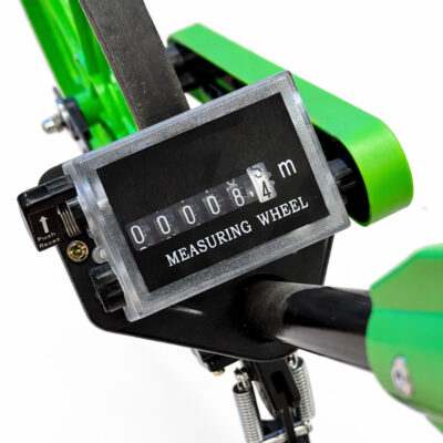 Grønt målehjul med håndbrems og sammenleggbart design for måling av avstander i felt